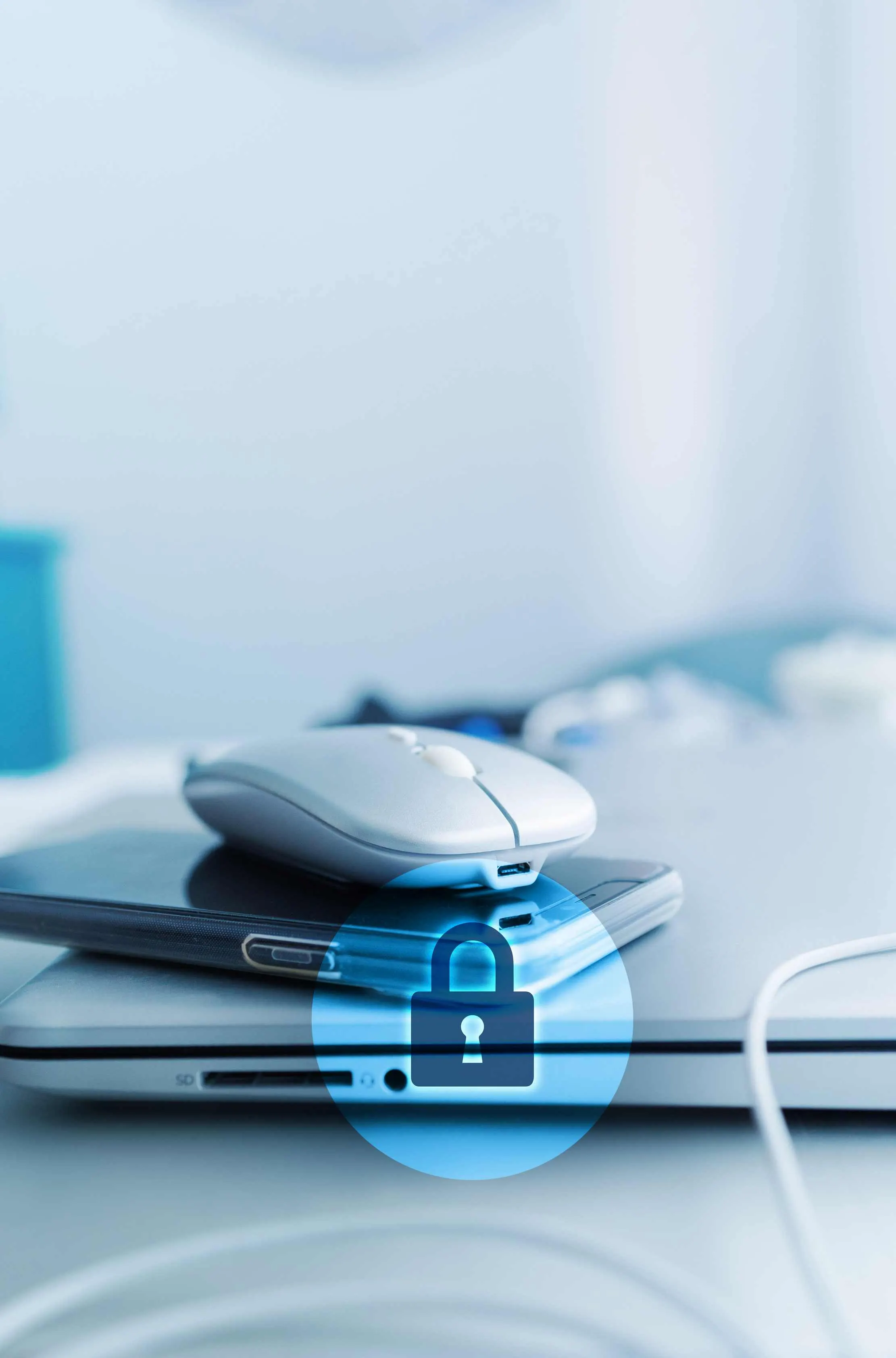 Laptop with a padlock and security key — Maduuka's API is built on least-privilege principles